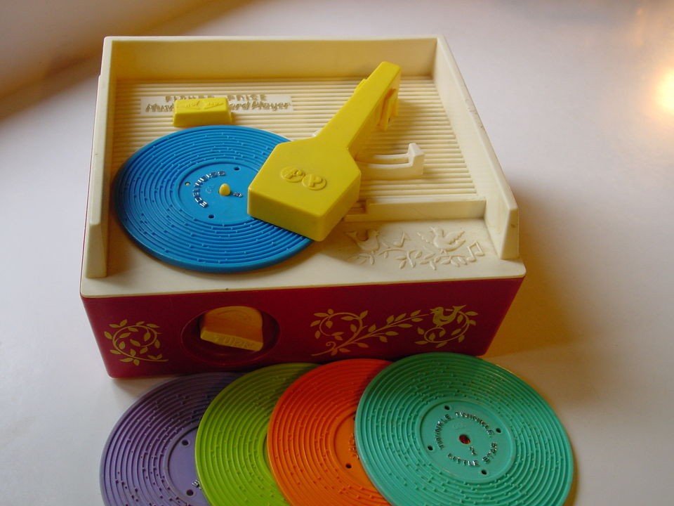 Vintage windup FISHER PRICE MUSIC BOX RECORD PLAYER with 5 records