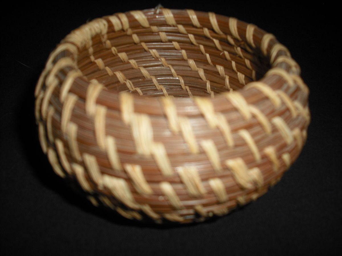 Vintage Coushatta Indian pine needle basket with original tag